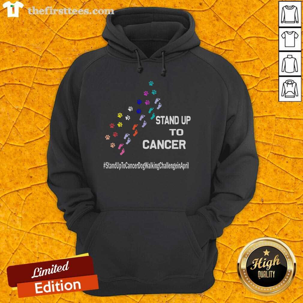 Person in a hoodie with 'Top Dog' and paw print, promoting the Stand Up To Cancer dog walking challenge in April.