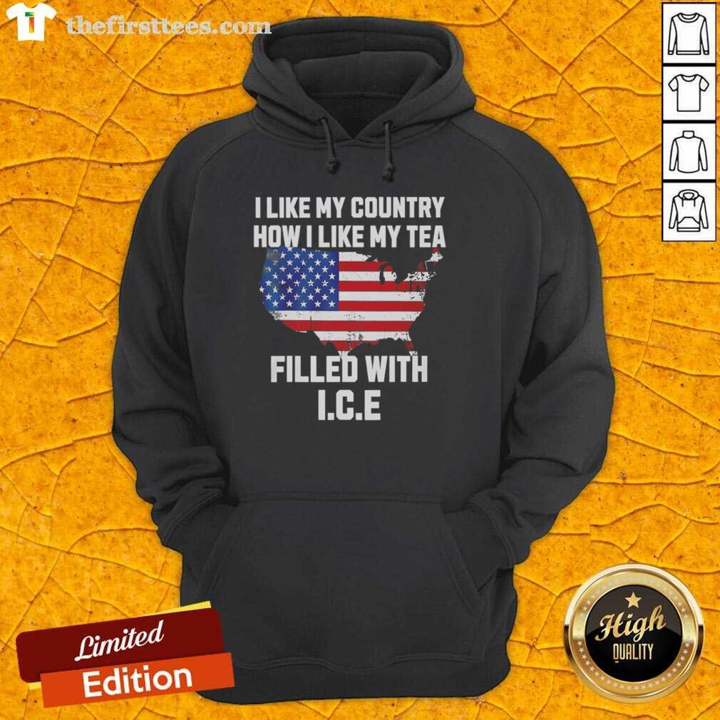 Cozy 'I Like My Country How I Like My Tea Filled With Ice' hoodie displayed on a wooden surface, perfect for casual wear.