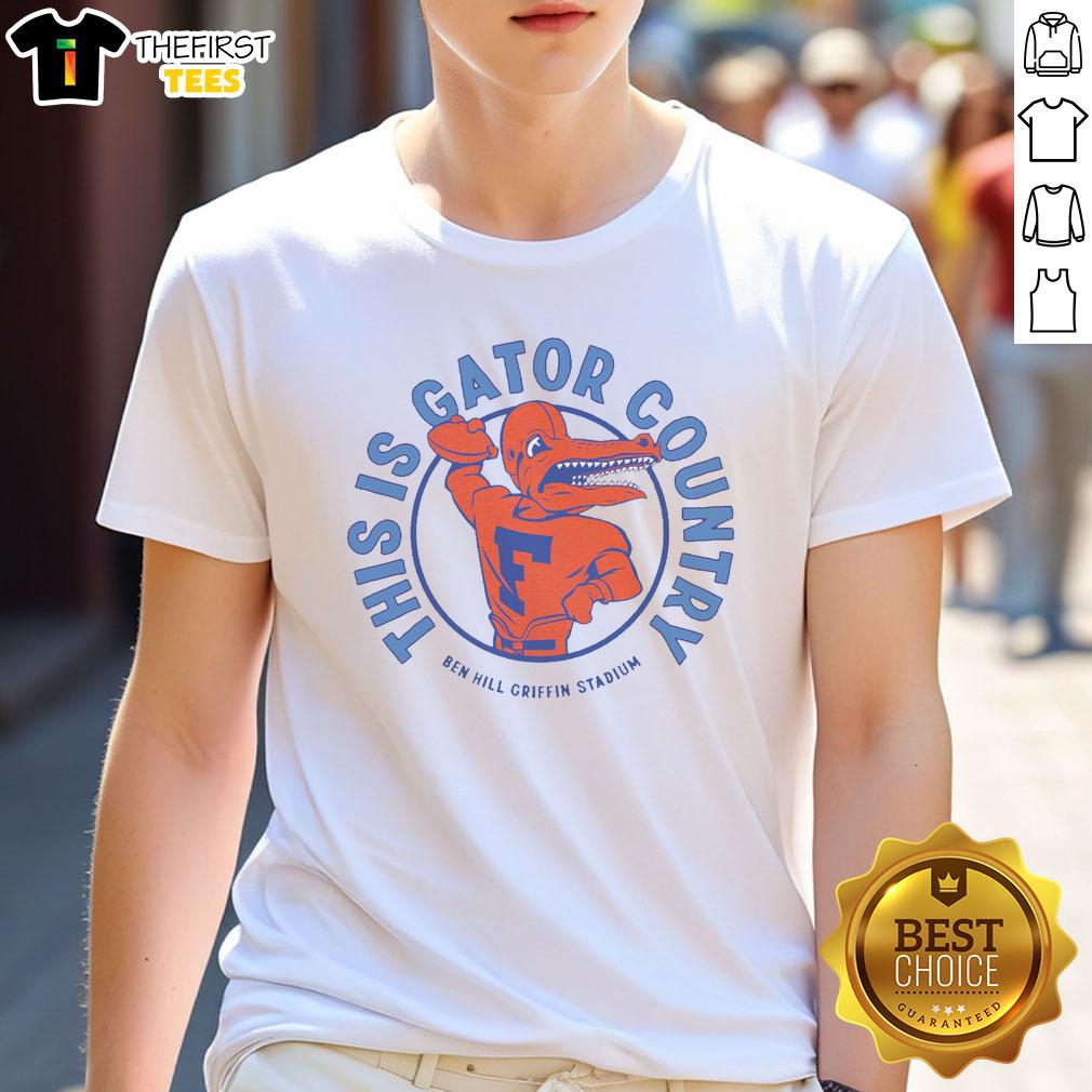 Vintage 'Top This Is Gator Country Florida' T-shirt design featuring an alligator graphic and retro font style.