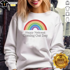 Person wearing a Pretty Happy National Coming Out Day rainbow sweatshirt, celebrating LGBTQ+ pride and inclusivity.