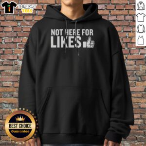 Top Not Here For Likes Hoodie displayed on a neutral background, showcasing its unique design.