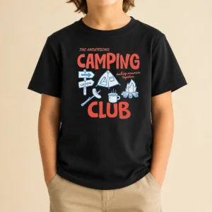 Good The Andersons Camping Club Making Memories Together Campfire Kids T Shirt displayed on a child-sized crew neck short sleeve tee