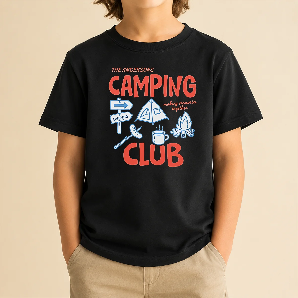Good The Andersons Camping Club Making Memories Together Campfire Kids T Shirt displayed on a child-sized crew neck short sleeve tee