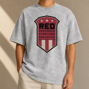 Original Red Remember Everyone Deployed Military Support Shield washed t shirt showing front design and soft fabric texture
