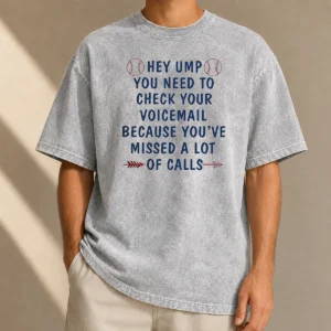 Premium Hey Ump You Need To Check Your Voicemail Because You Have Missed A Lot Of Calls printed on a soft washed t shirt in neutral color