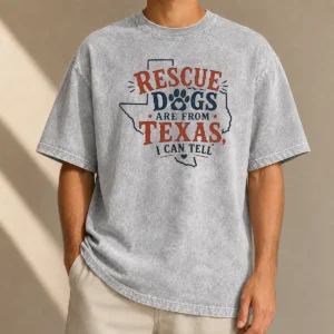 Pretty Rescue Dogs Are From Texas I Can Tell washed t shirt shown flat with soft fabric texture